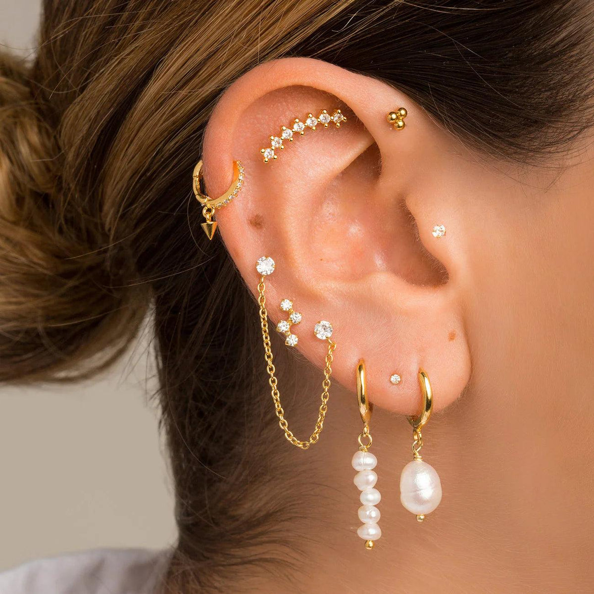 Aeretes ¿Qué tipo de arete usar para una perforación en la oreja? – Adamina