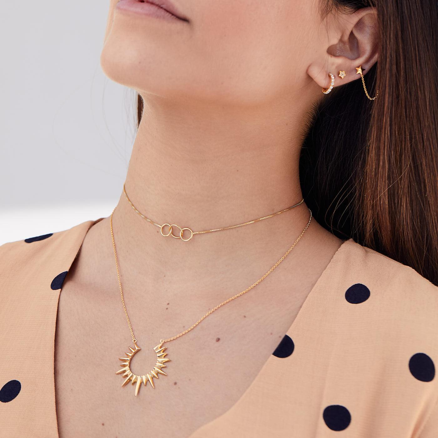 Damenhalsband mit Halskette Elysse Gold. Adamina