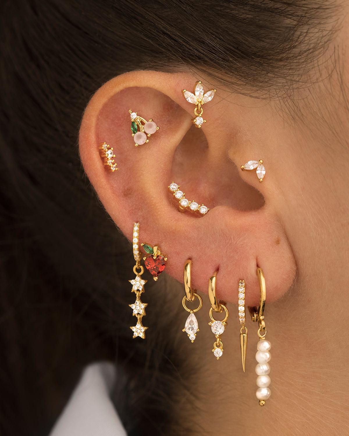 PIERCING À LA POMME D'OR